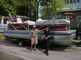 pontoon boat loaded on trailer