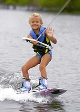 child wakeboarding